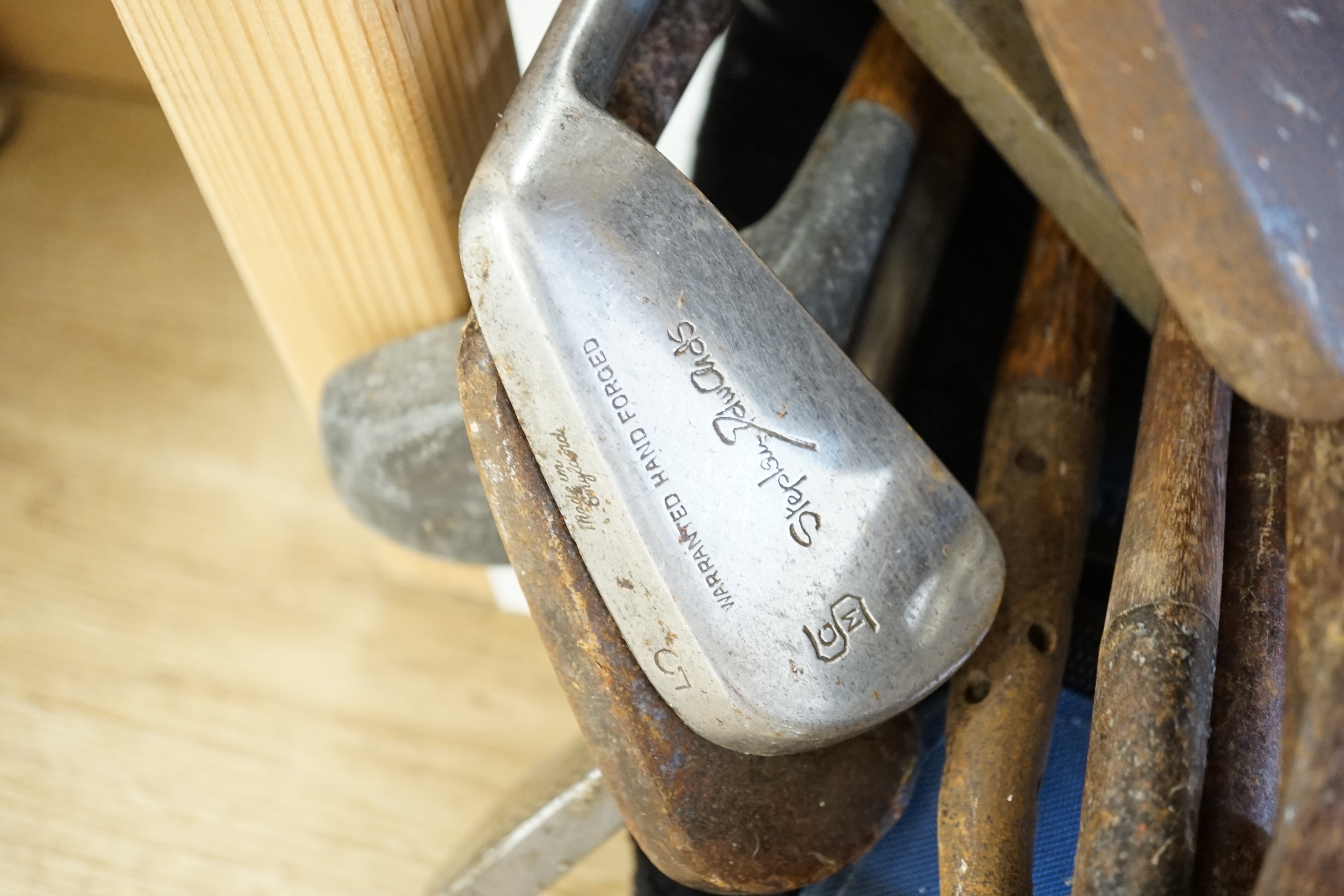 A collection of golf clubs, largely hickory shafted with two cases. Condition - varies